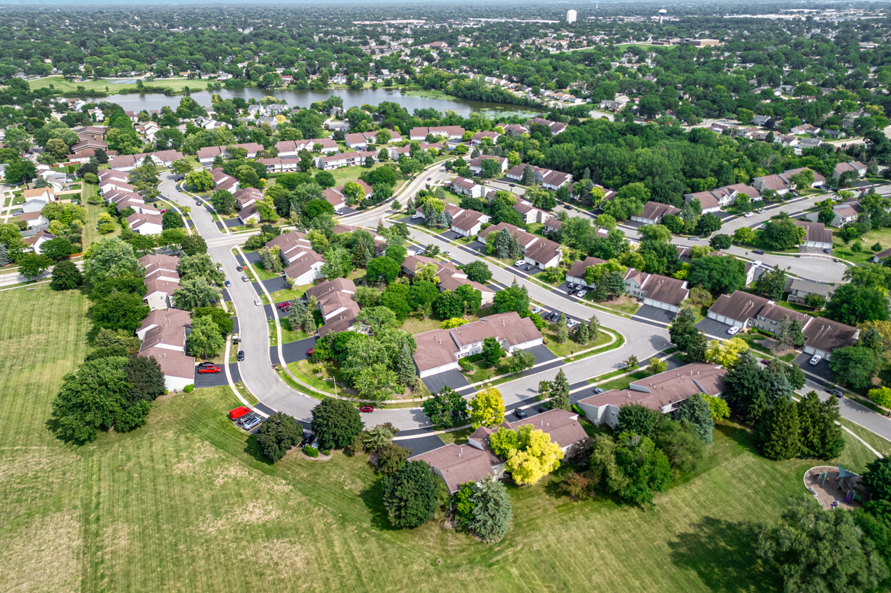 15 Gant Circle, Unit E Streamwood, IL 60107 - Photo 20 of 21 an aerial view of residential houses with outdoor space and trees