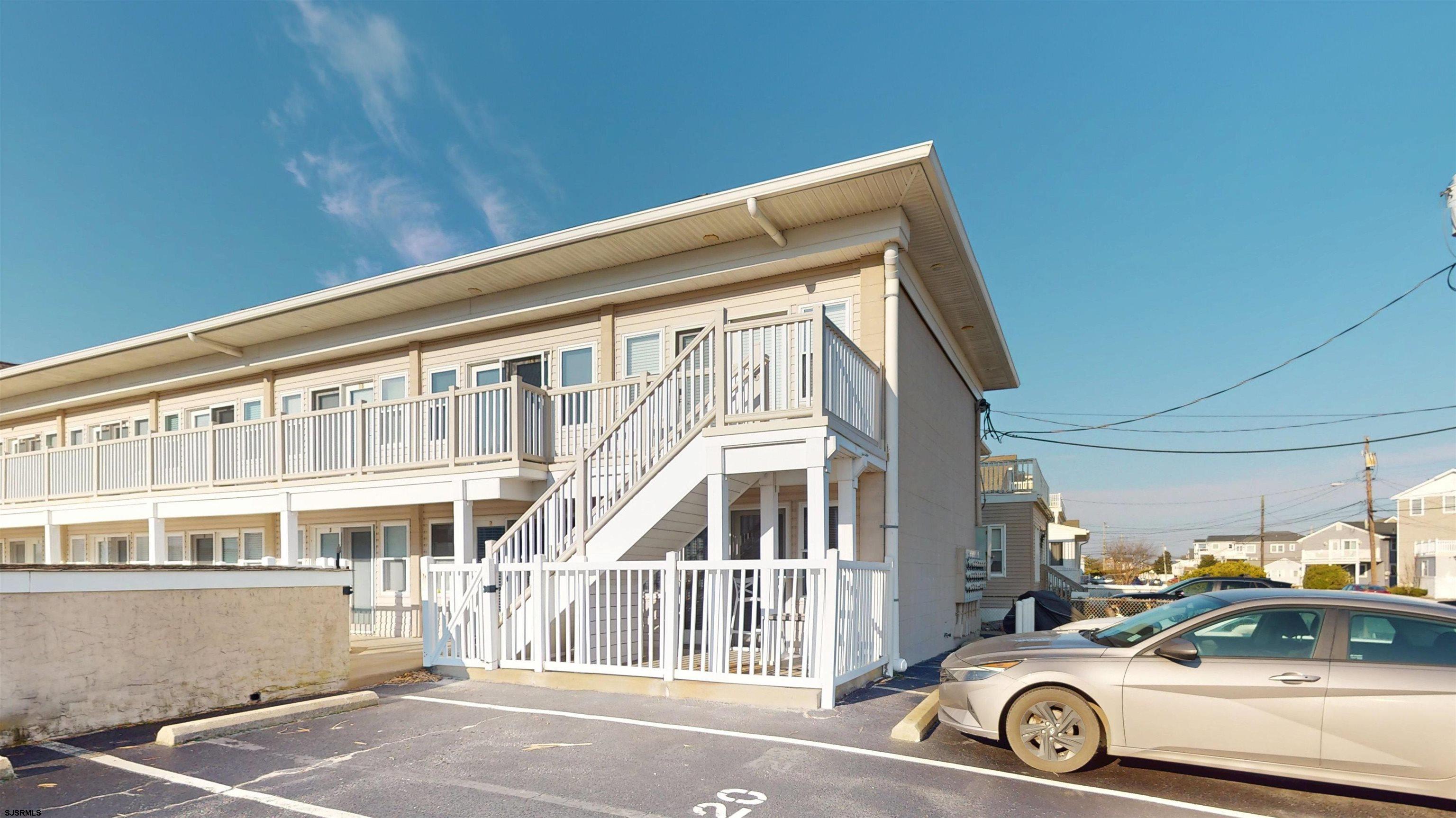 719 East Brigantine Avenue, Unit 1A Brigantine, NJ 08203 - Photo 24 of 37 a view of a car parked in front of a building