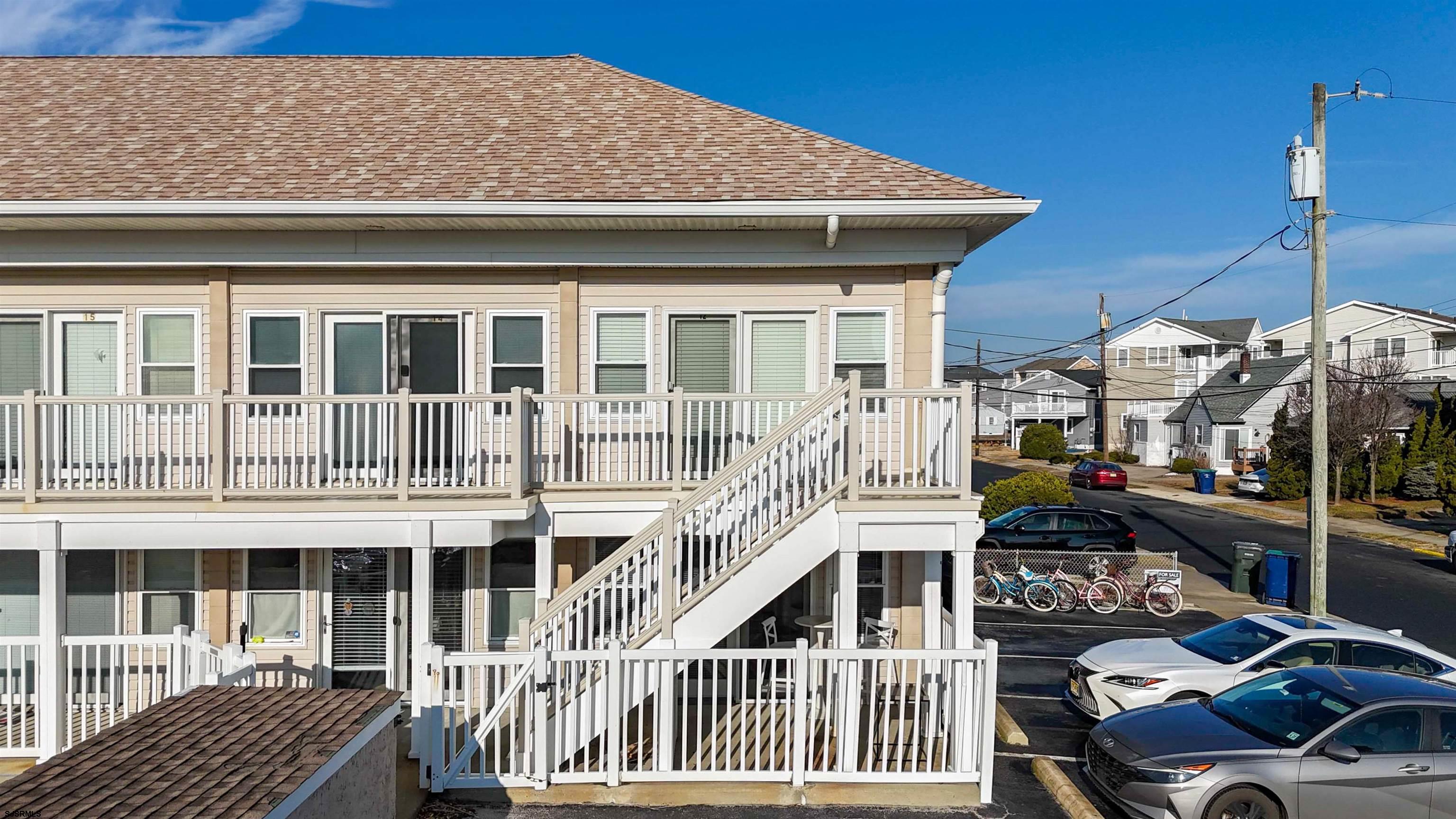 719 East Brigantine Avenue, Unit 1A Brigantine, NJ 08203 - Photo 35 of 37 a view of a house with a cars park side of a road