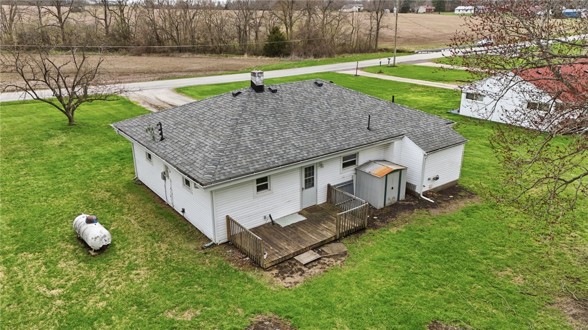 1166 West Sparrow Road Springfield, OH 45502 - Photo 5 of 40 This residence features an outdoor deck perfect for enjoying the expansive yard and surrounding natural beauty.