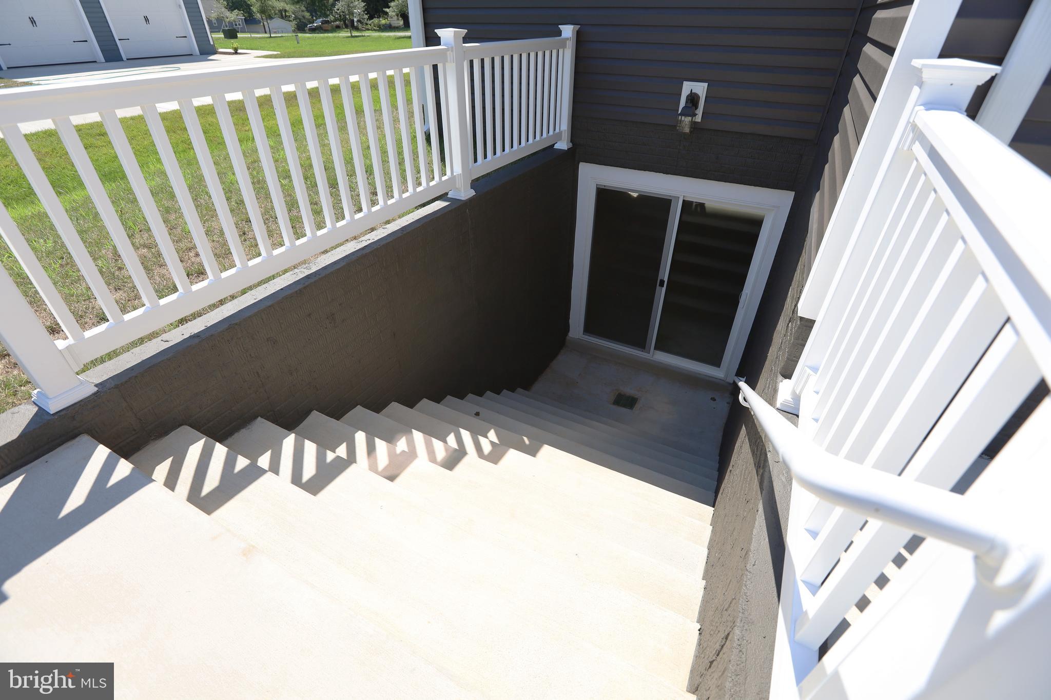 11893 Bradley Forest Road Manassas, VA 20112 - Photo 56 of 60 Walk-up Stairs from LL to Backyard