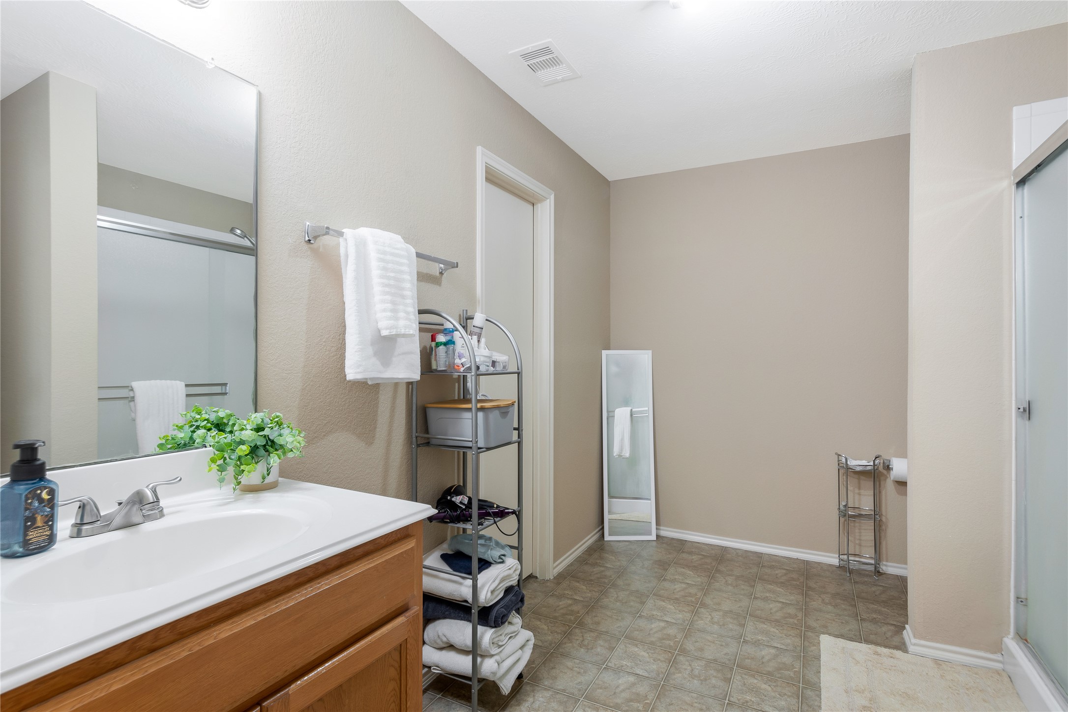 16306 Rustic Stable Lane Cypress, TX 77429 - Photo 19 of 32 The primary bathroom is large and spacious... your own private spa!