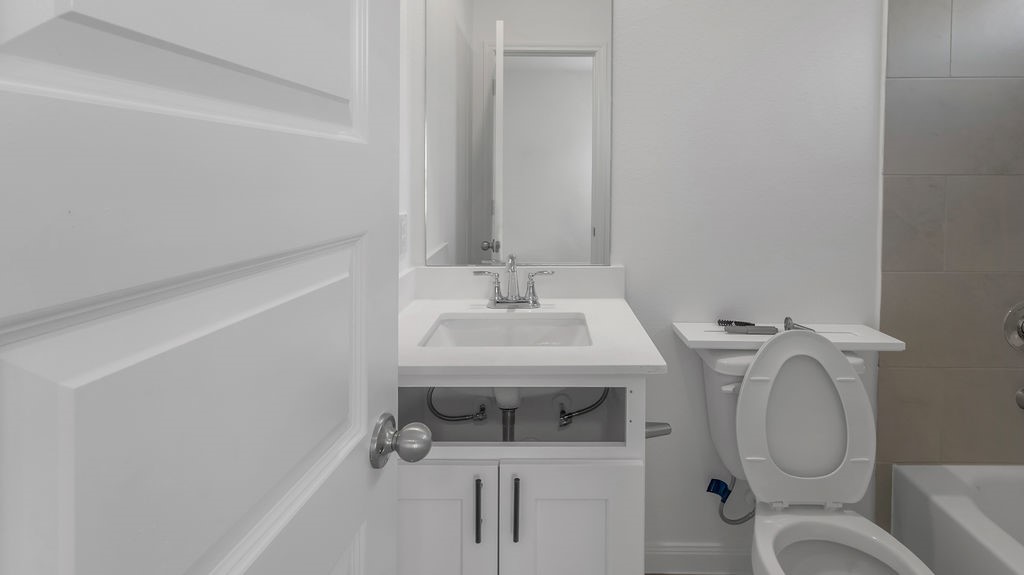 14131 Mellow Pne Court Houston, TX 77032 - Photo 14 of 30 a bathroom with a sink and a toilet