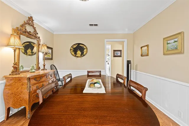 a view of a hallway with a washer and dryer