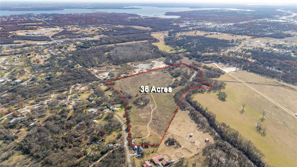 1170 Arvel Circle, Unit A Azle, TX 76020 - Photo 3 of 12 an aerial view of residential houses with outdoor space