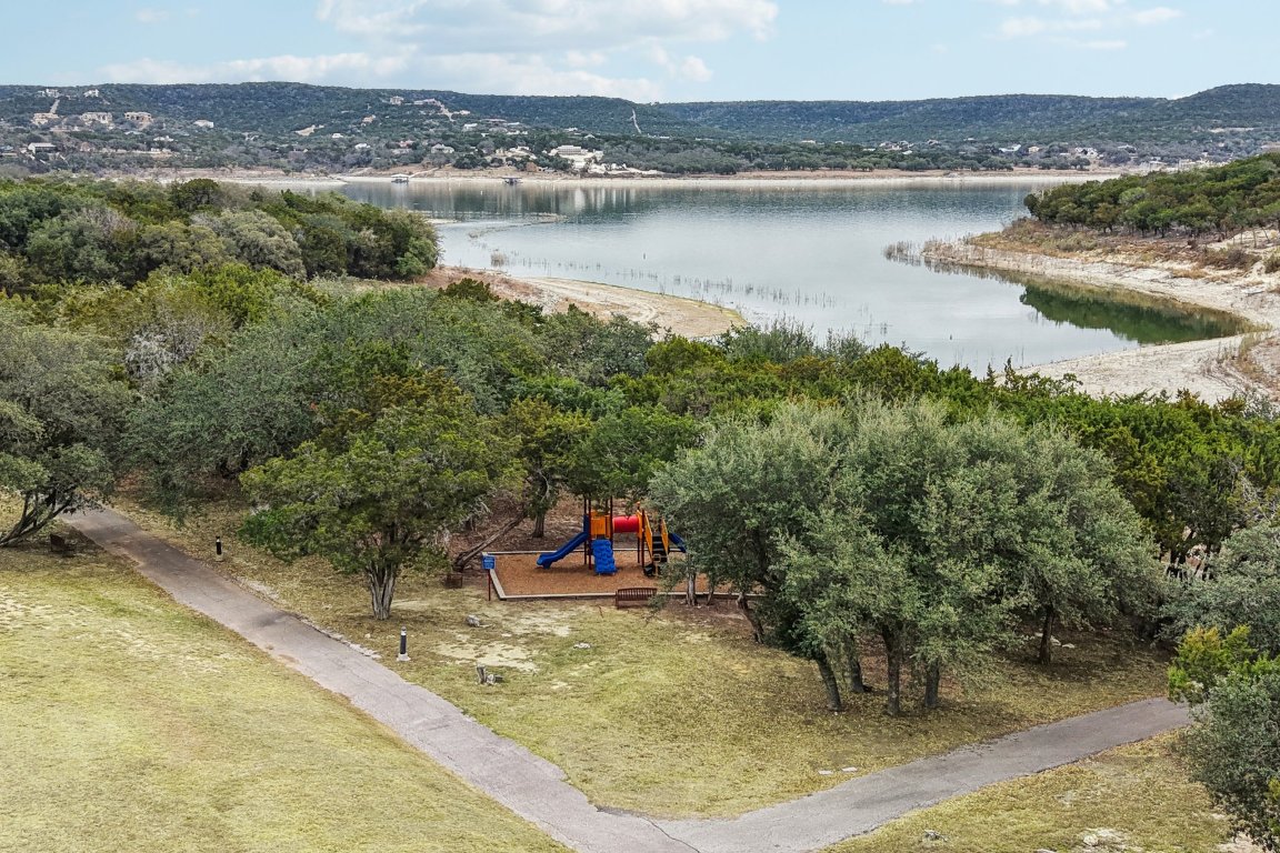 17507 Navigation Lane Lago Vista, TX 78645 - Photo 12 of 16 an aerial view of a house with a yard and lake view
