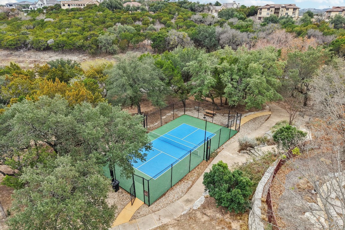 17507 Navigation Lane Lago Vista, TX 78645 - Photo 16 of 16 an aerial view of a house with a yard and lake view