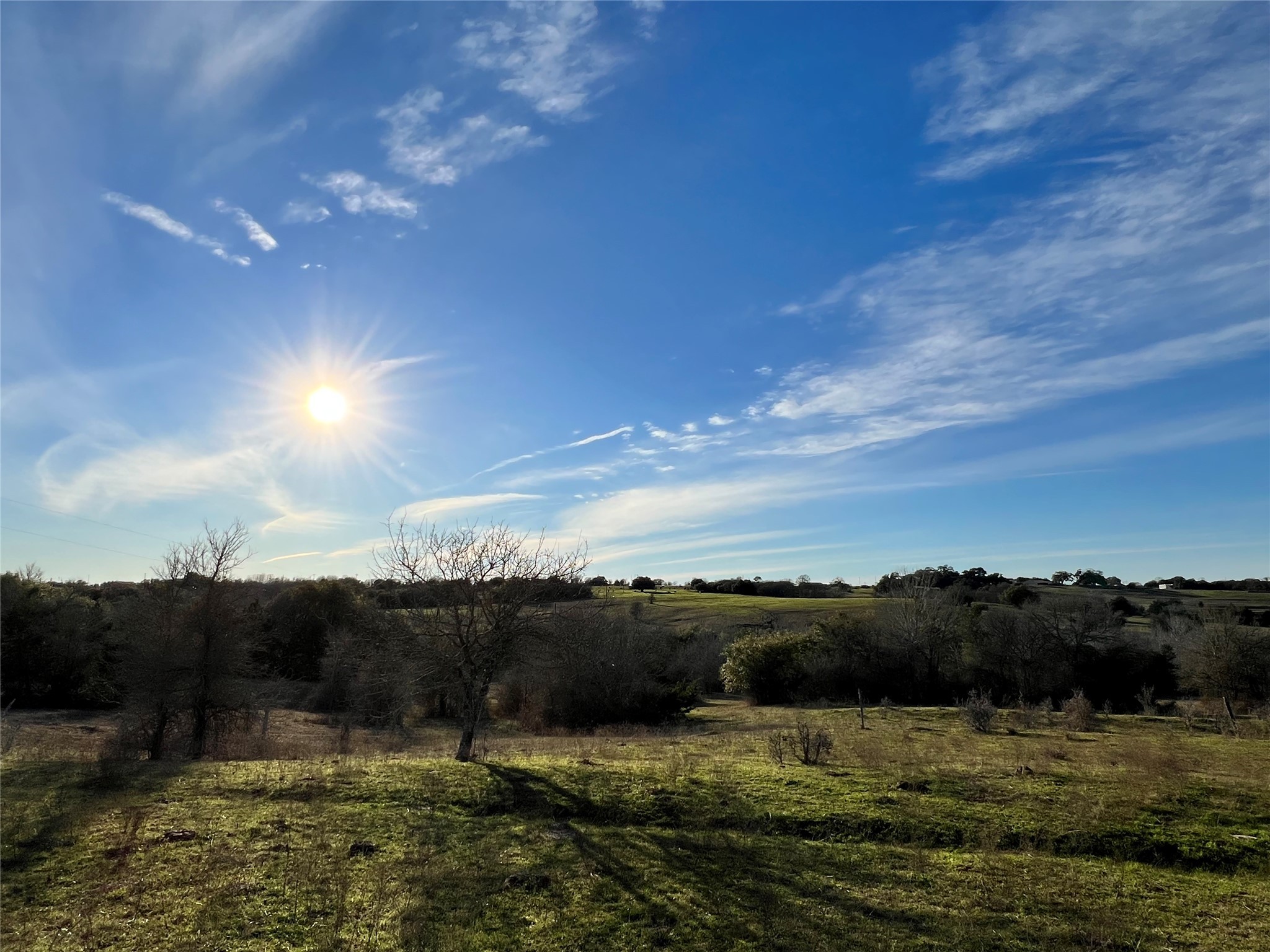 10021 Oil Field Road Brenham, TX 77833 - Photo 3 of 14 a view of a lake and mountain view