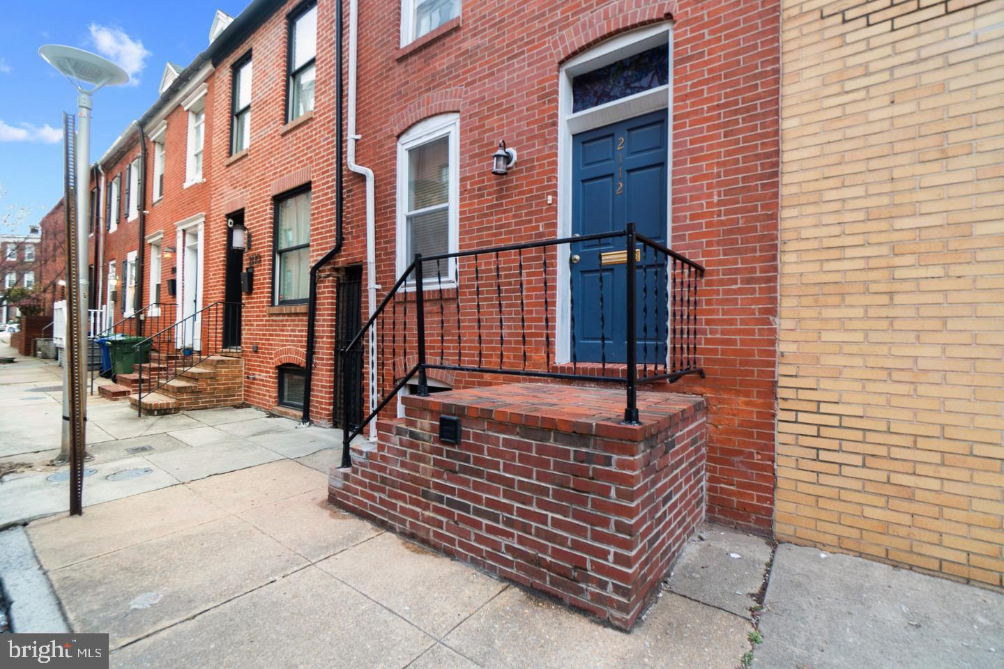 2112 Cambridge Street Baltimore, MD 21231 - Photo 1 of 20 a view of entryway with brick walls