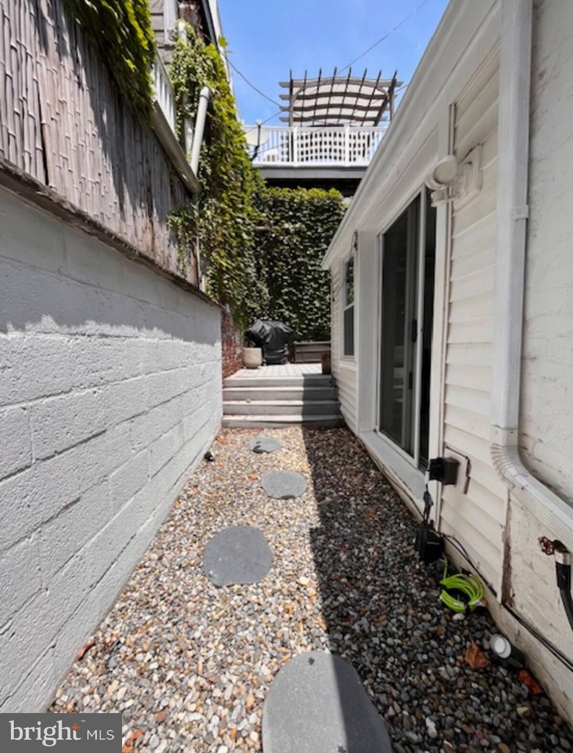 2112 Cambridge Street Baltimore, MD 21231 - Photo 20 of 20 a view of a pathway with a house