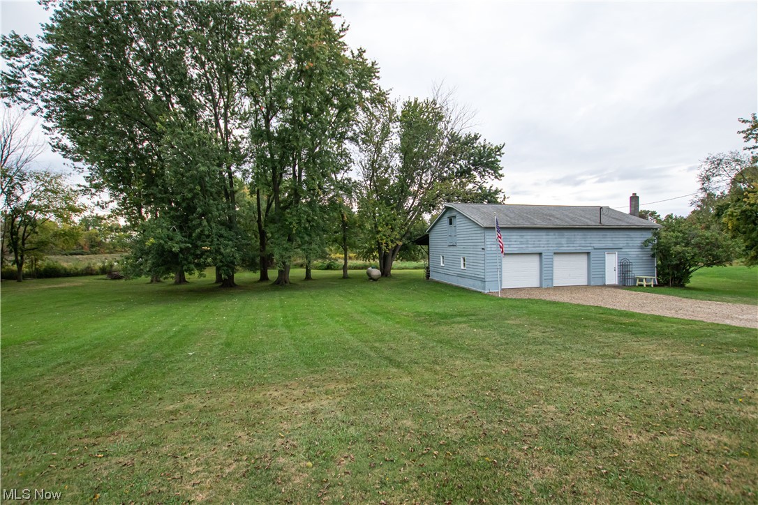 3946 Poe Road Medina, OH 44256 - Photo 30 of 35 View of yard featuring garage