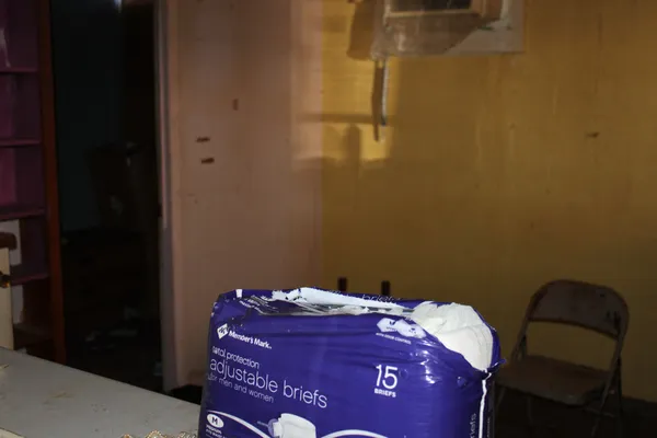 a room with a sink and cabinets