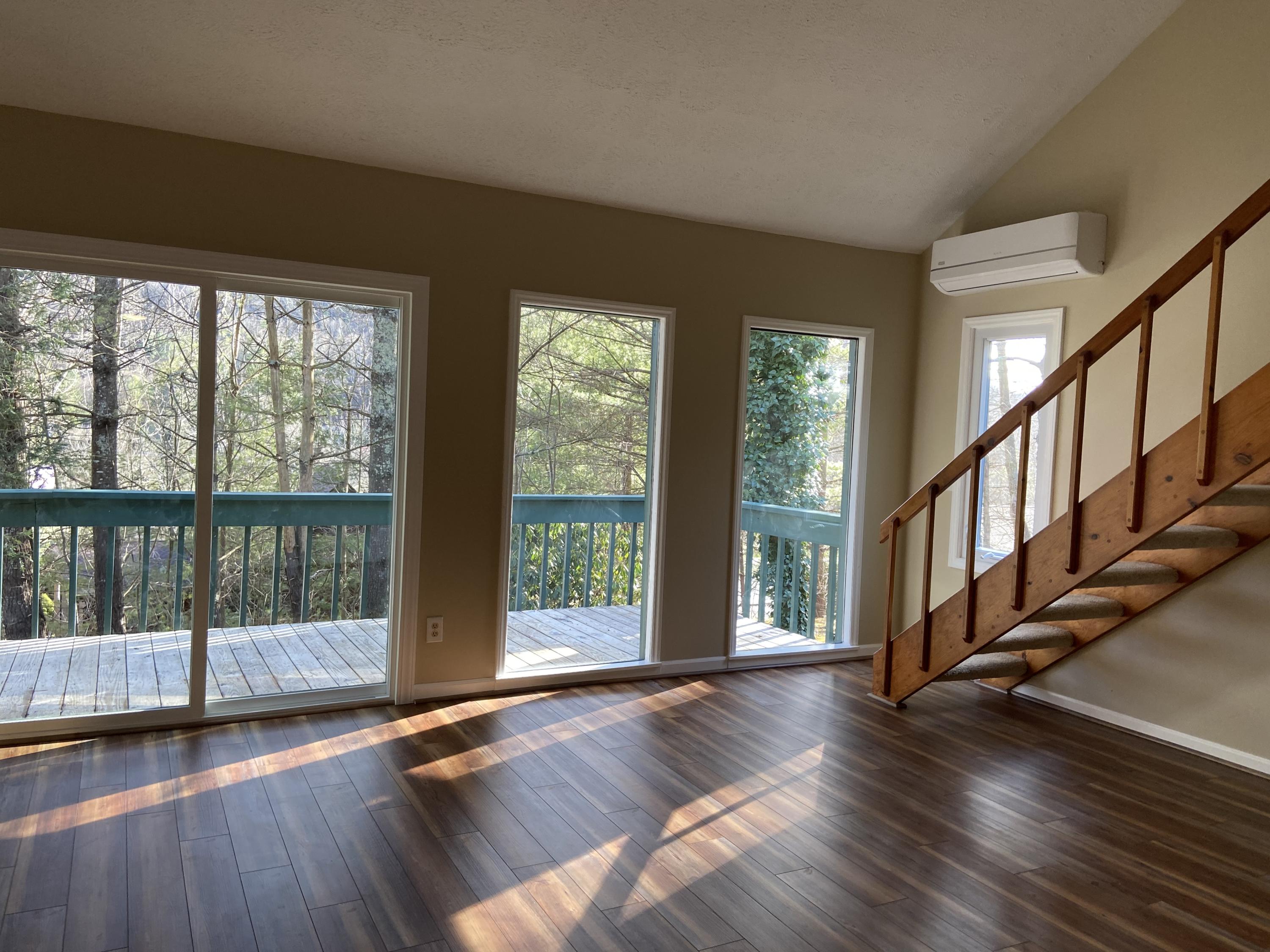 201-3 South Slope Road, Unit N3 Banner Elk, NC 28604 - Photo 27 of 36 LIVING ROOM & DECK