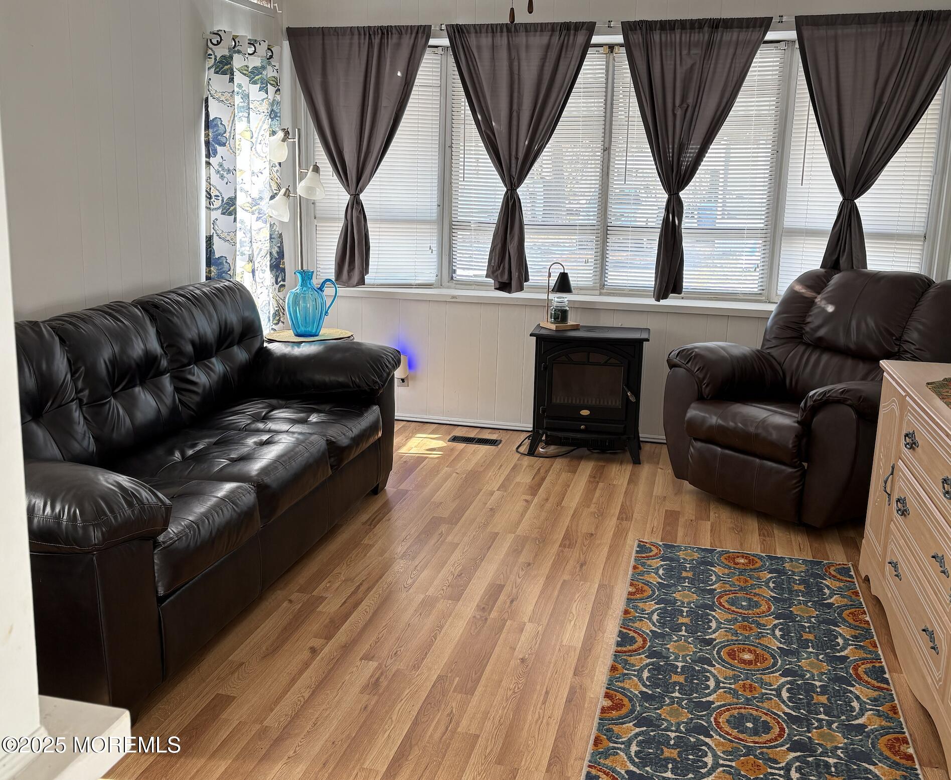 10 Helen Avenue Jackson, NJ 08527 - Photo 2 of 13 a living room with furniture a window and a fireplace