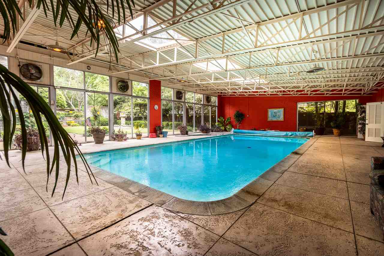 4330 Chickasaw Road Memphis, TN 38117 - Photo 23 of 25 OLYMPIC-SIZED POOL, HIS -N-HER BATHS, PERFECT FOR THE BIG SPLASH PARTY