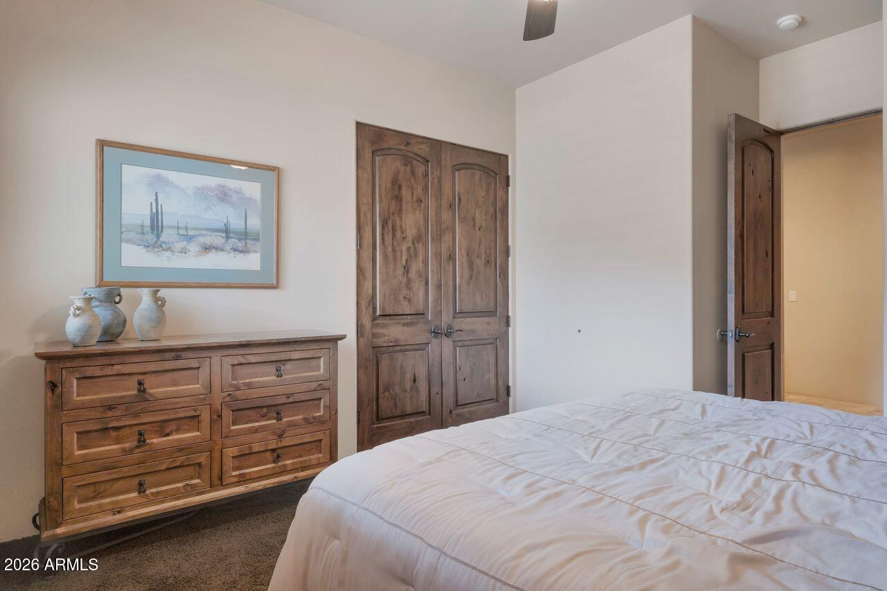 18507 East Picacho Road Rio Verde, AZ 85263 - Photo 23 of 33 a bedroom with a bed and a closet