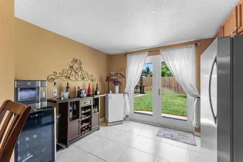 a view of a livingroom with furniture and a window