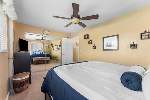 a bathroom with a toilet a sink and bathtub