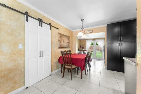 a view of a dining room with furniture