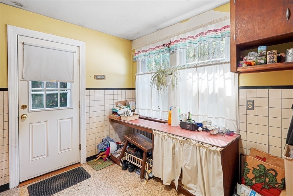 74 River Road Sturbridge, MA 01566 - Photo 14 of 40 a room with a baby crib furniture and a window