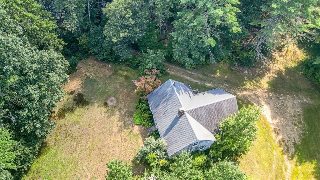 74 River Road Sturbridge, MA 01566 - Photo 38 of 40 an aerial view of a house with yard