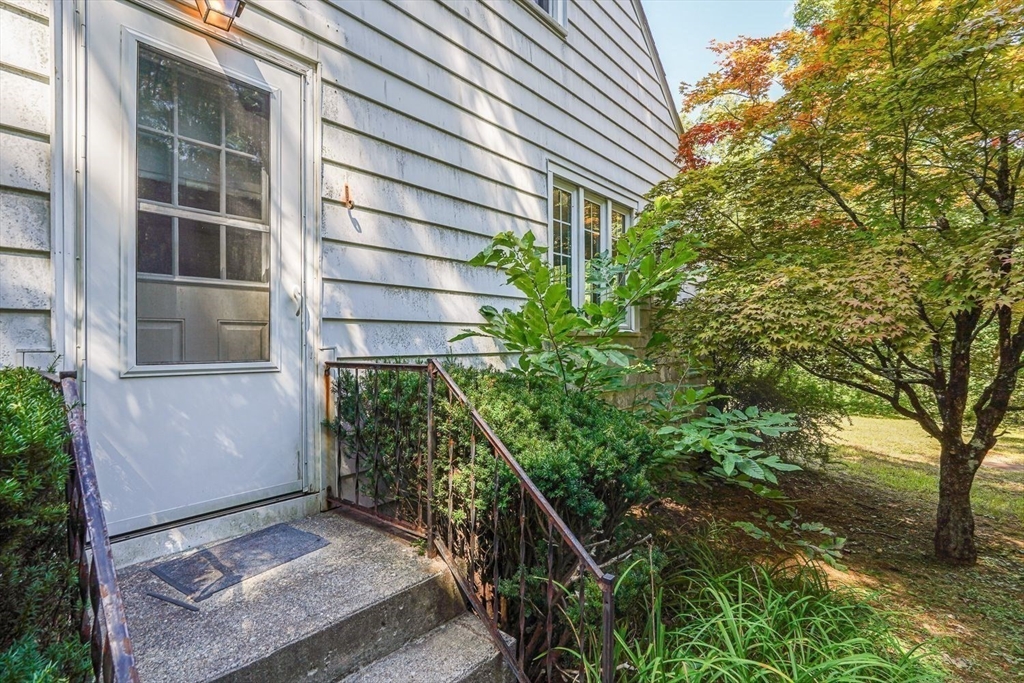 74 River Road Sturbridge, MA 01566 - Photo 6 of 40 a house view with a garden space