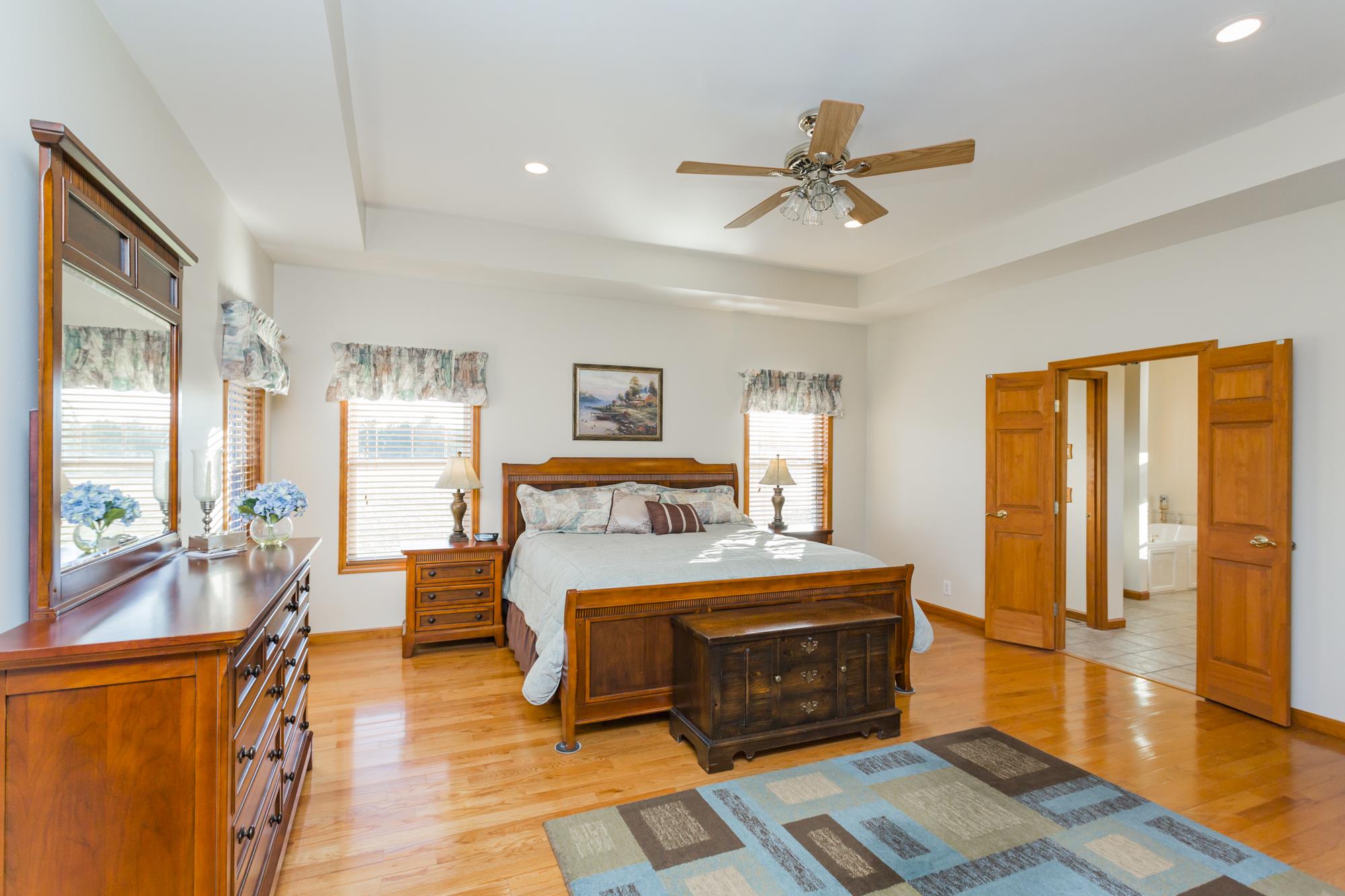 7768 Gum Puckett Road Murfreesboro, TN 37127 - Photo 12 of 27 The Master Suite - Spacious 18x17 Master retreat with hardwood floors, matching wood blinds, and on-suite bath. Privately situated off the Living Room and opposite side of living area from the other bedrooms.