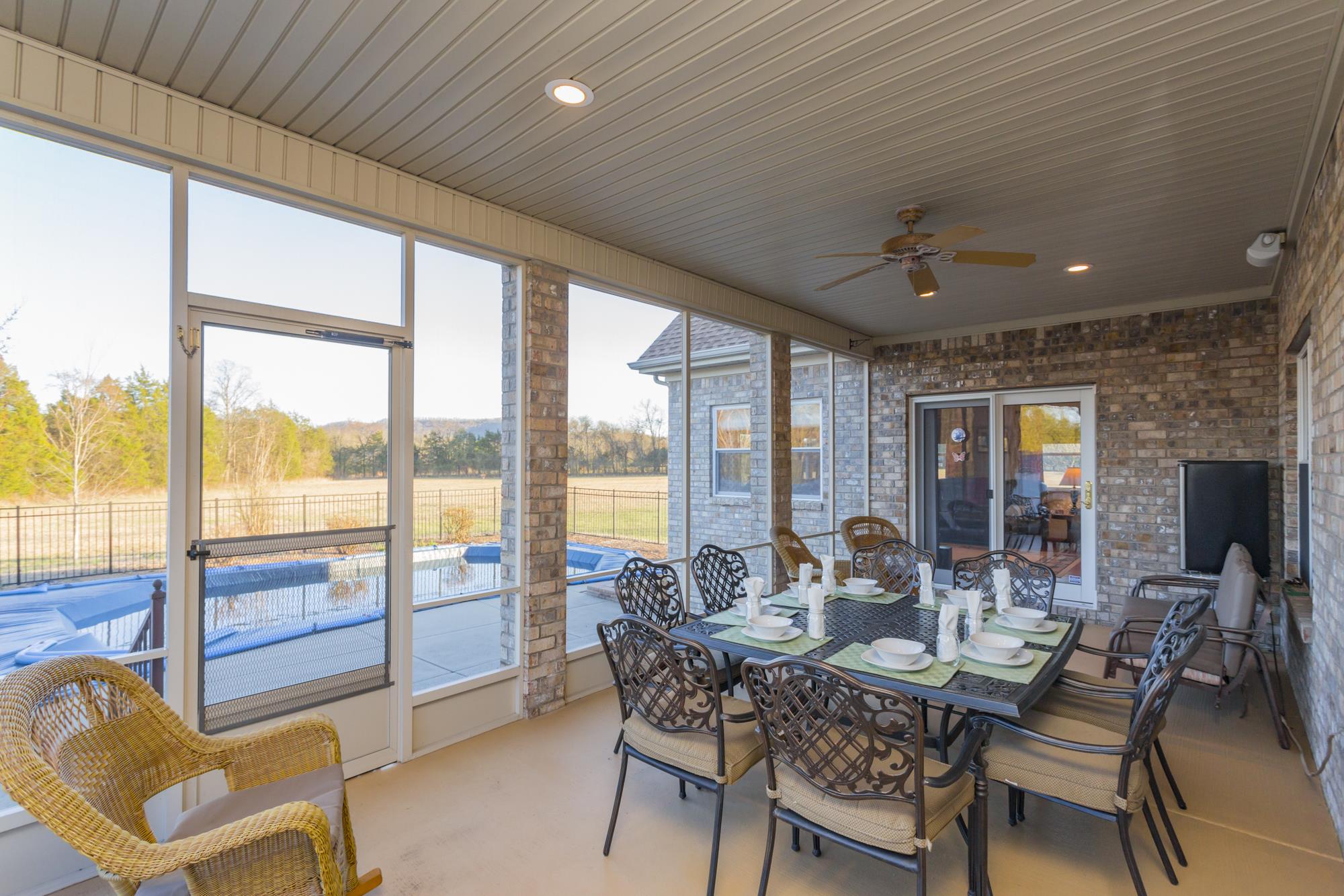 7768 Gum Puckett Road Murfreesboro, TN 37127 - Photo 20 of 27 Screened porch just off the Den. Great for all your out door relaxing and dining needs.
