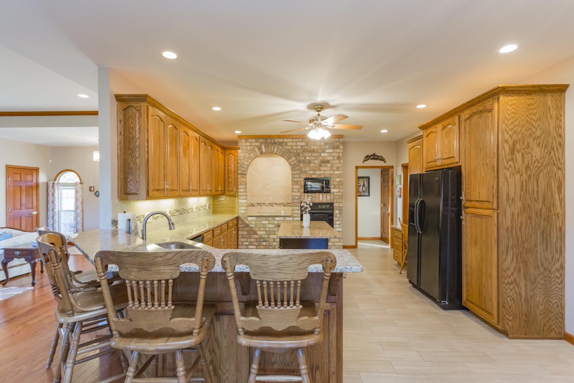 7768 Gum Puckett Road Murfreesboro, TN 37127 - Photo 6 of 27 The perfect Kitchen for the Country Gourmet! Charming Brick Wall adding character and warmth to this room. Updated tile floors only 2.5 years old.
