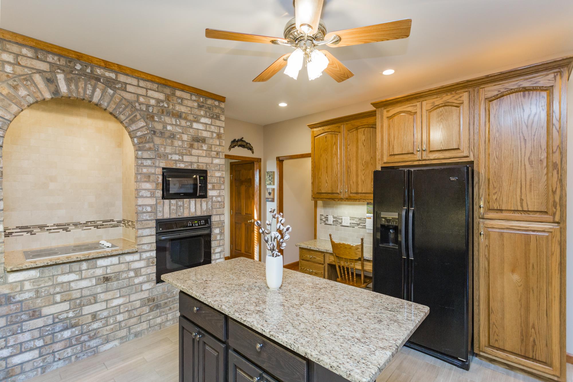 7768 Gum Puckett Road Murfreesboro, TN 37127 - Photo 8 of 27 On the right we have a work desk and built in Pantry cabinets. Lots of storage for all your dishes and cooking equipment.