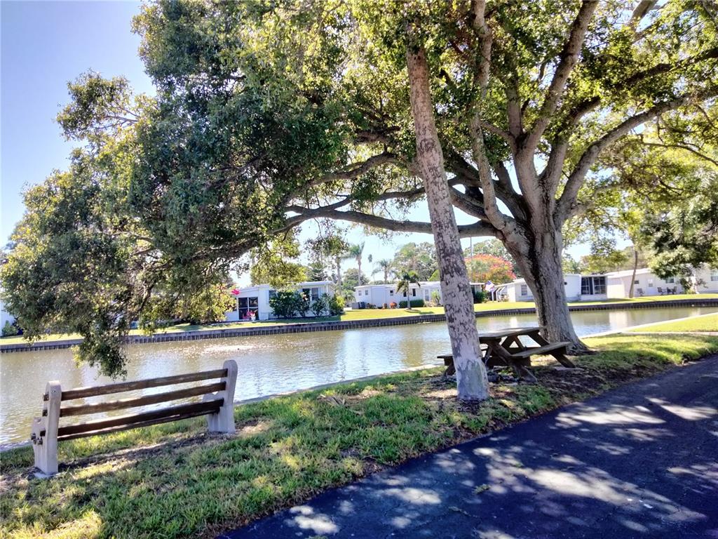 980 7th Street Northwest, Unit 1 Largo, FL 33770 - Photo 34 of 36 a view of a lake with outdoor space