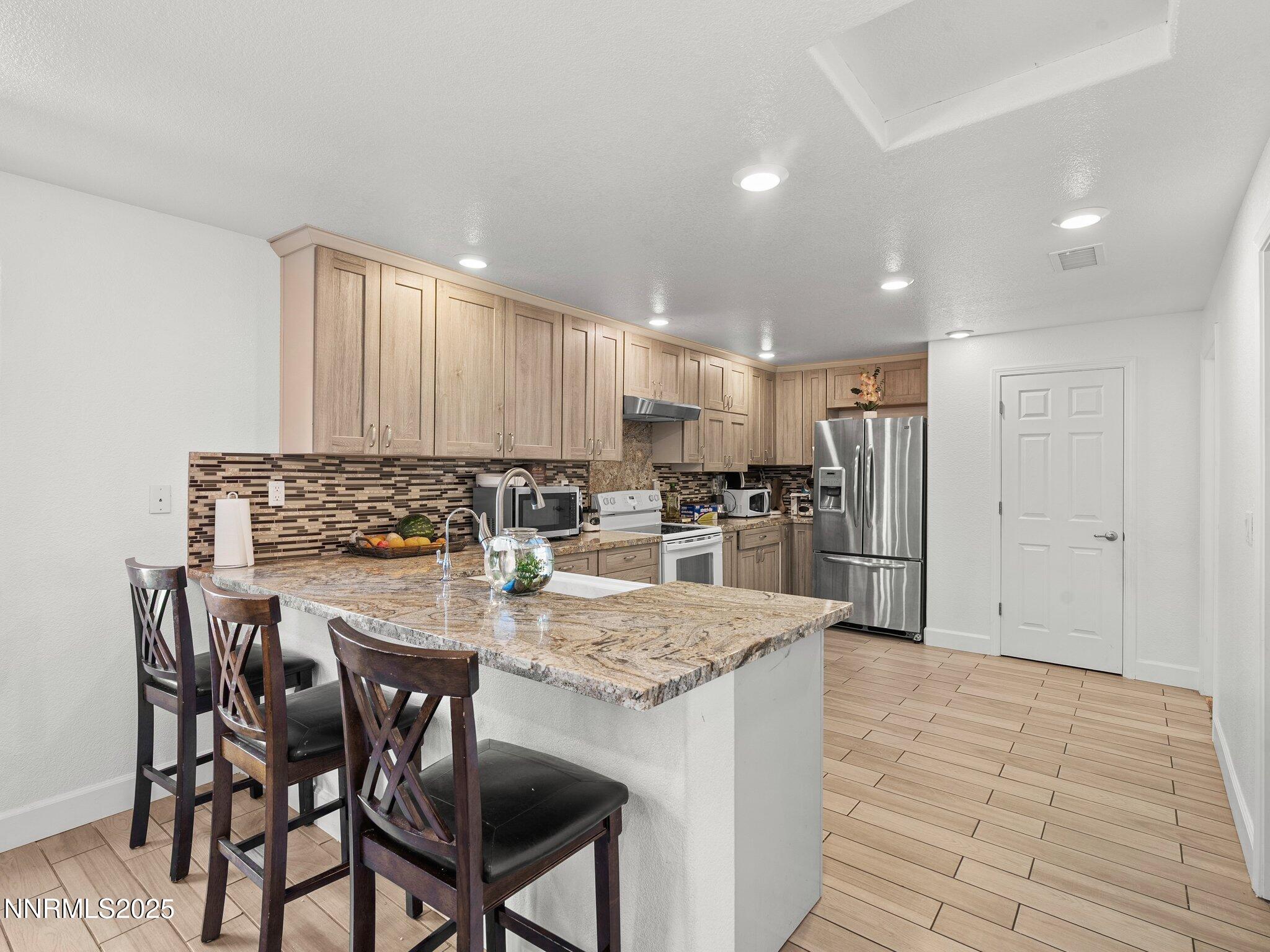 5216 Sun Valley Boulevard Sun Valley, NV 89433 - Photo 10 of 26 5216 Sun Valley Blvd-111