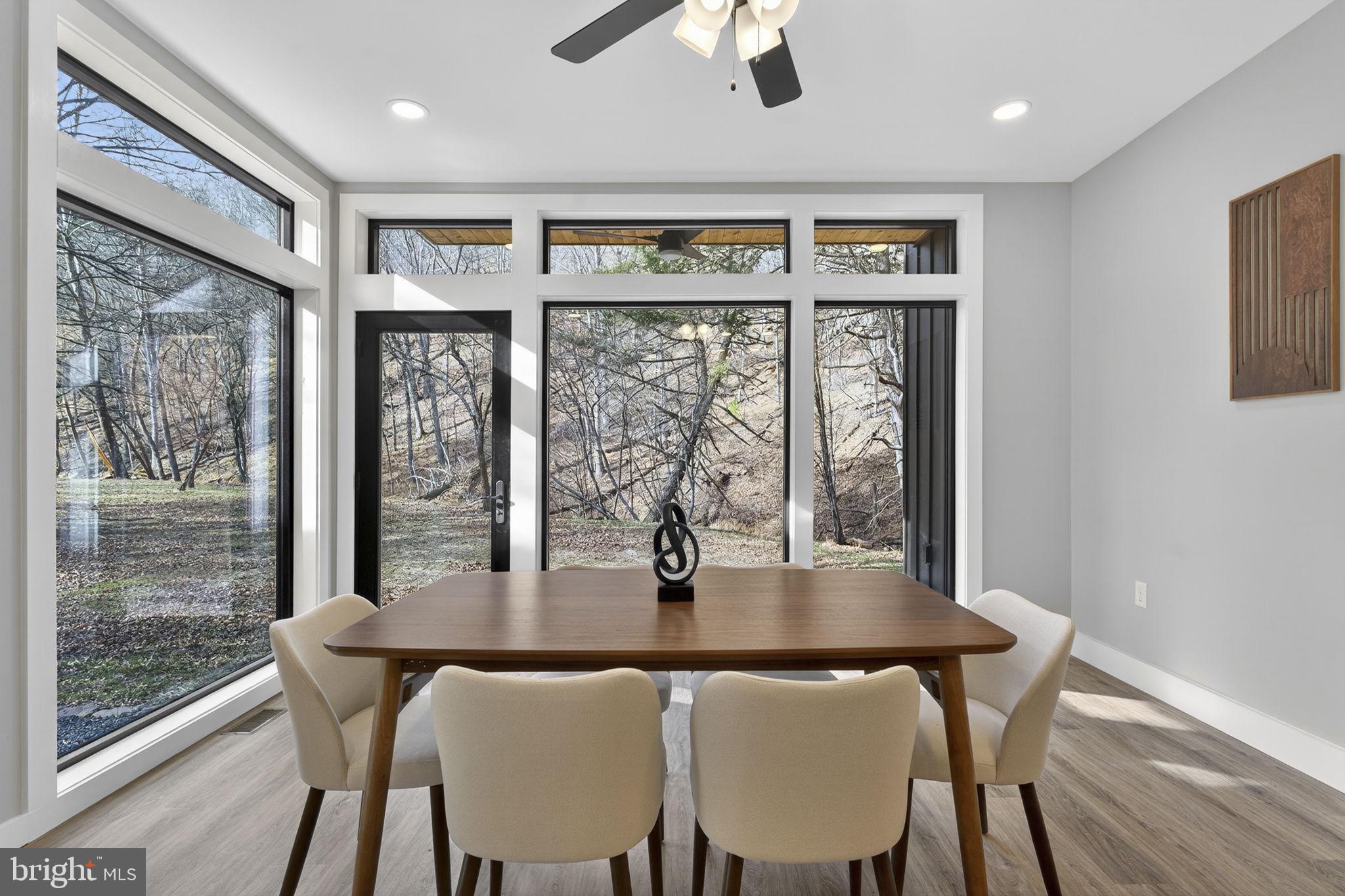 1956 Dove Hollow Road Mathias, WV 26812 - Photo 27 of 113 a dining room with furniture window wooden floor