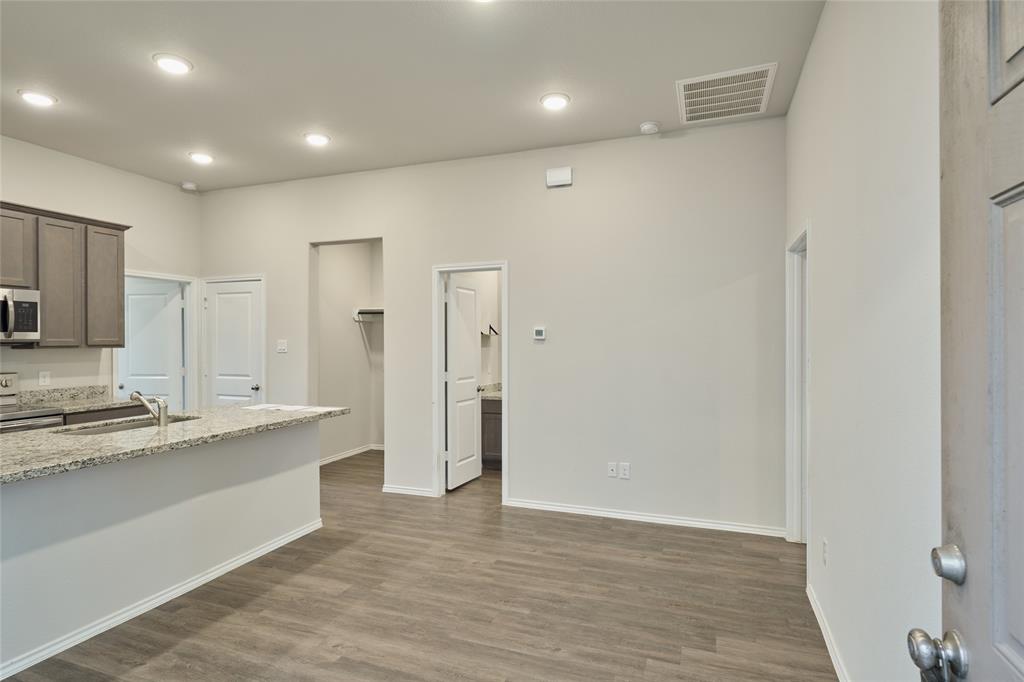 9992 Calendar Street Willis, TX 77318 - Photo 8 of 25 a large bathroom with a sink and a large mirror