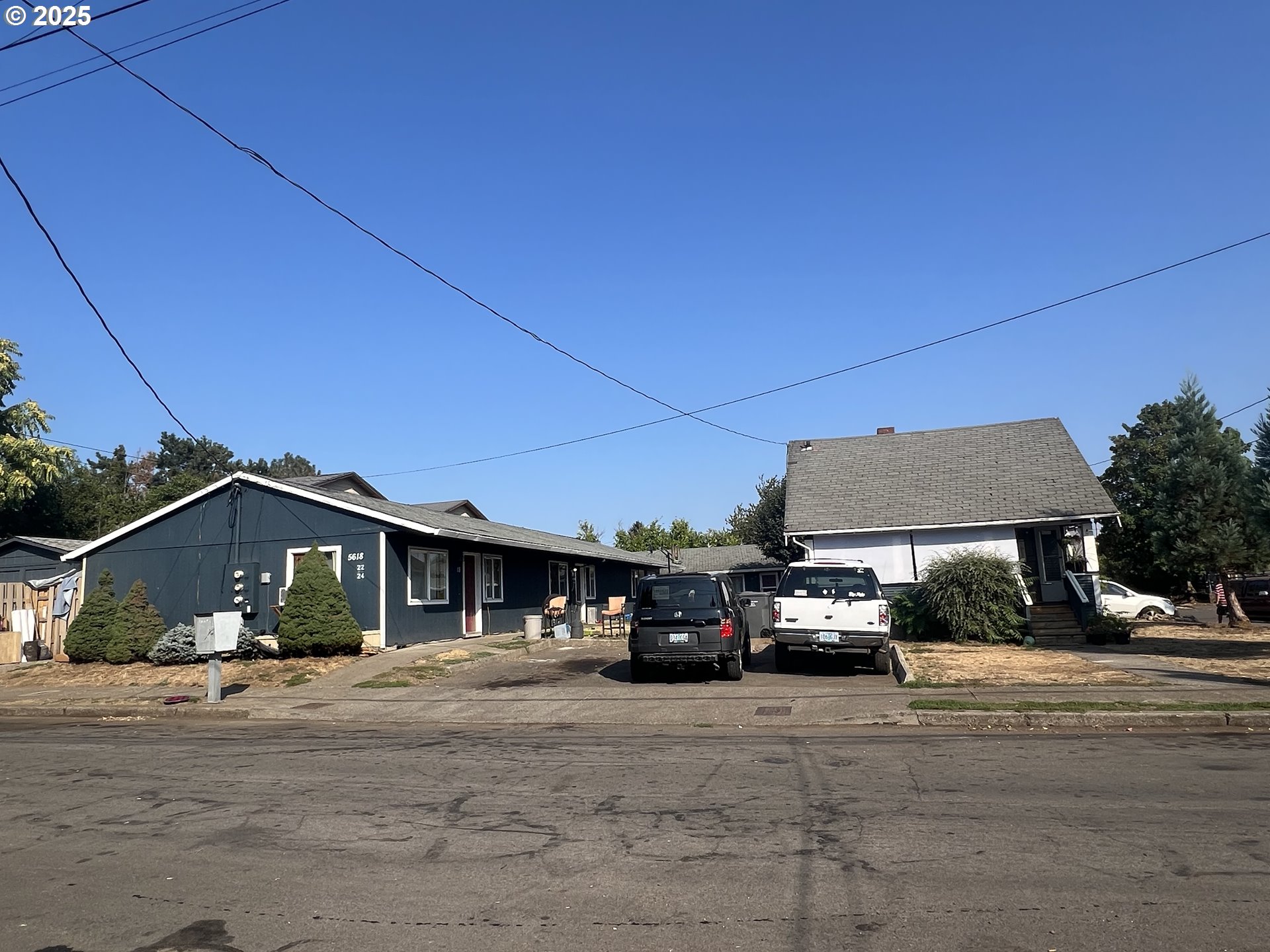 a car parked in front of houses