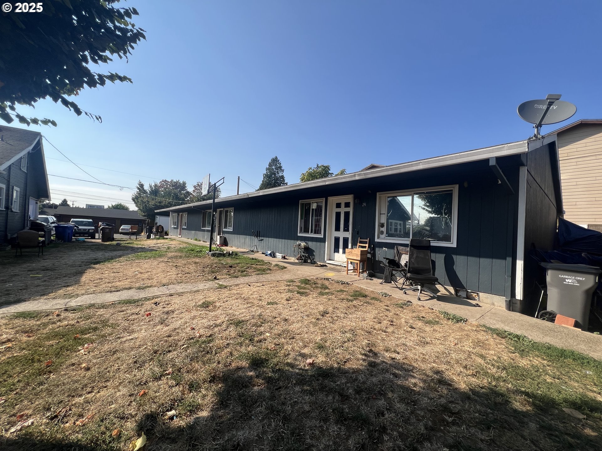 5628 Southeast 87th Avenue Portland, OR 97266 - Photo 7 of 10 a view of house with backyard and sitting area