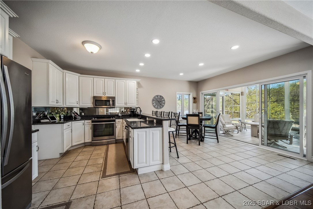 5889 Glaize Woods Road Osage Beach, MO 65065 - Photo 11 of 57