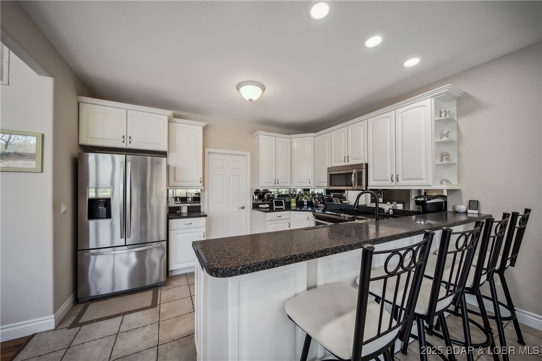 5889 Glaize Woods Road Osage Beach, MO 65065 - Photo 12 of 57