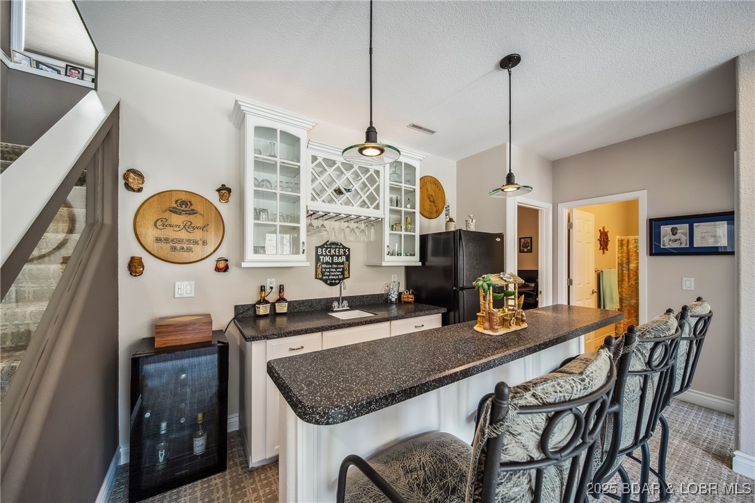 5889 Glaize Woods Road Osage Beach, MO 65065 - Photo 29 of 57 Wet Bar