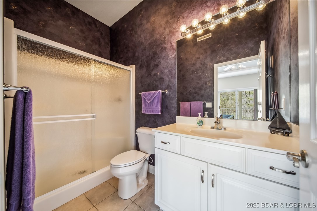 5889 Glaize Woods Road Osage Beach, MO 65065 - Photo 35 of 57 Private Bathroom for Lower Bedroom Suite