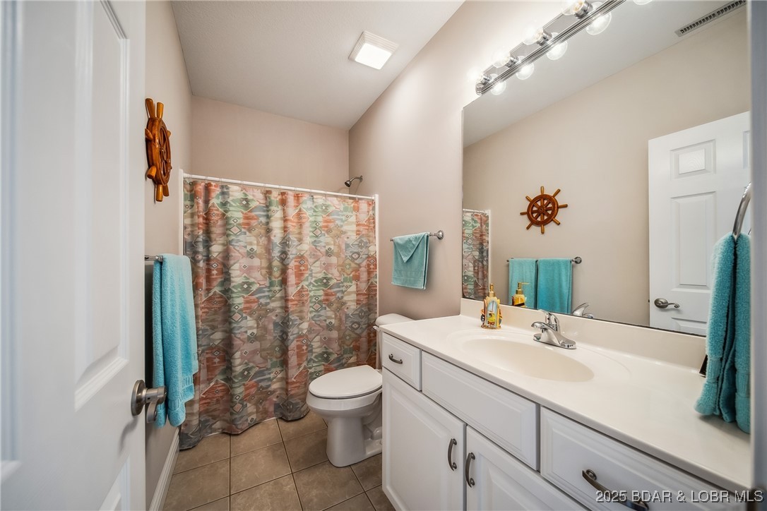 5889 Glaize Woods Road Osage Beach, MO 65065 - Photo 38 of 57 Guest Bath