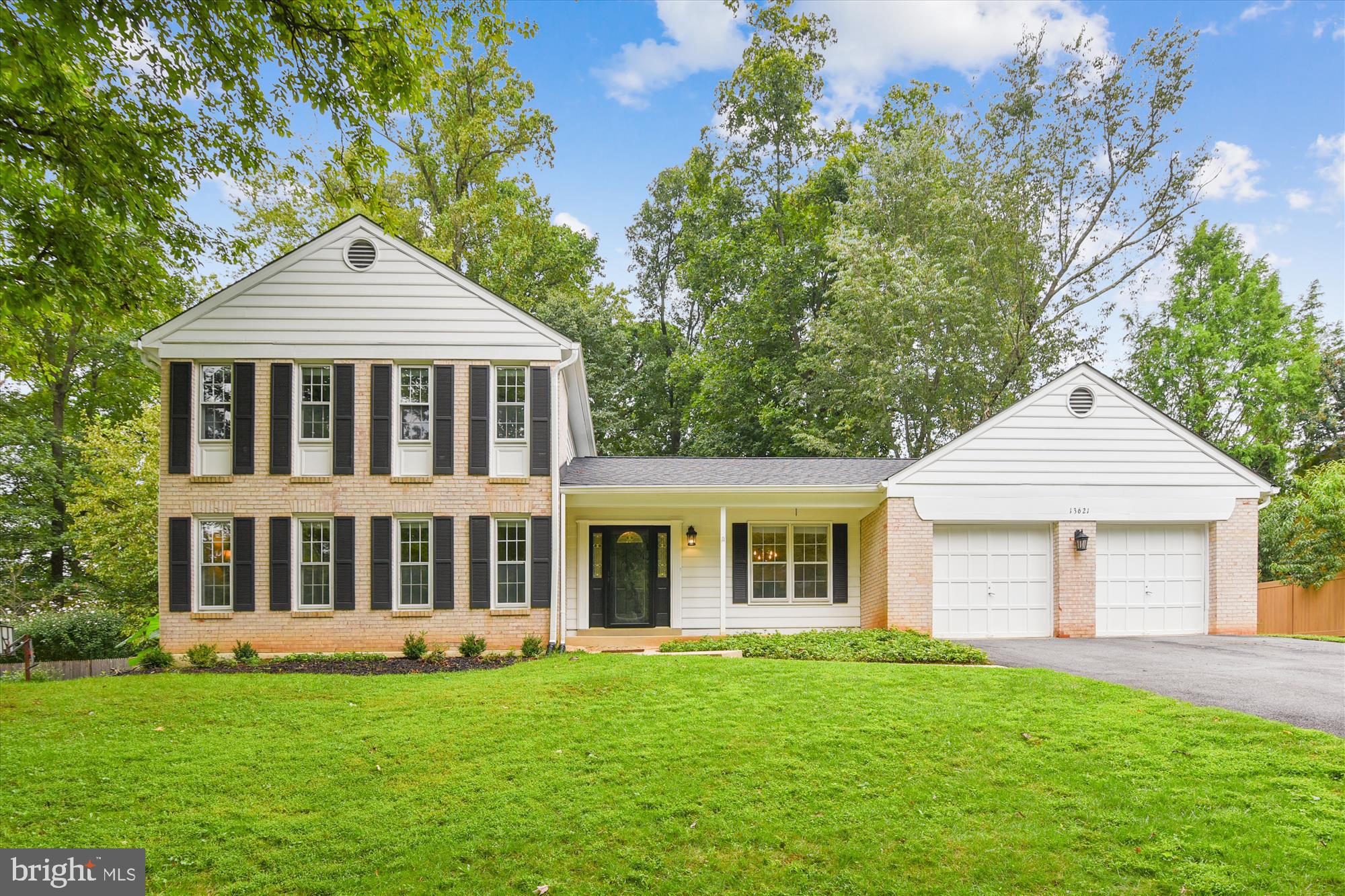 13621 Middlevale Lane Silver Spring, MD 20906 - Photo 1 of 25 front view of a house and a yard