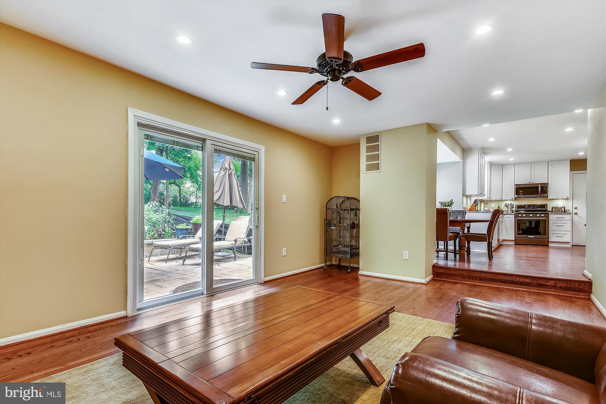 13621 Middlevale Lane Silver Spring, MD 20906 - Photo 12 of 25 a living room with furniture and a large window