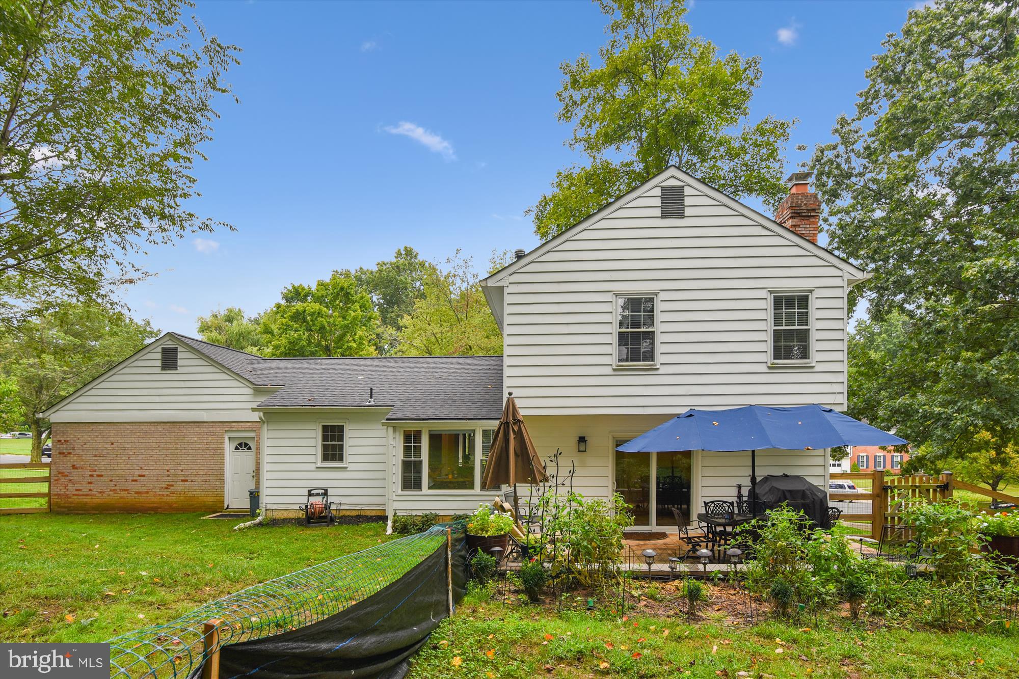13621 Middlevale Lane Silver Spring, MD 20906 - Photo 21 of 25 a front view of house with yard and green space