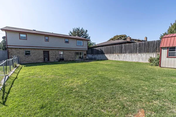 a house view with a garden space