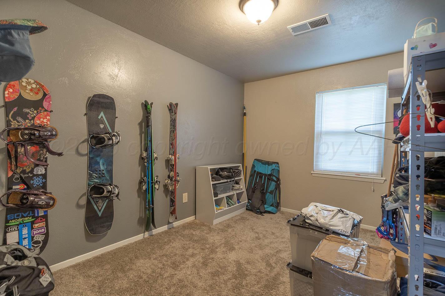 121 Houston Street Borger, TX 79007 - Photo 6 of 21 a view of a room with gym equipment