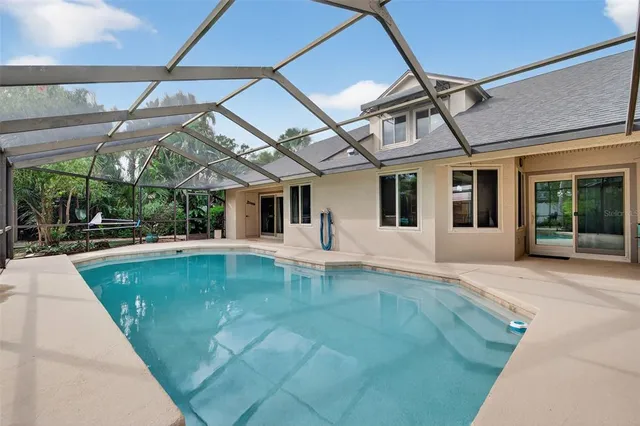 a view of a livingroom with furniture and entryway