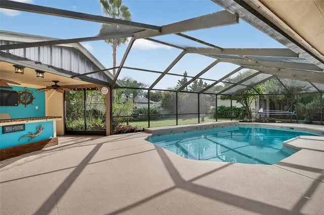 a bedroom with a bed dresser and a window