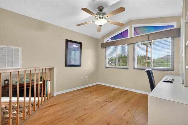 a bathroom with a tub sink and a mirror