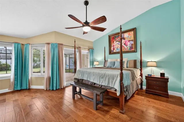 a kitchen with granite countertop a sink stove and refrigerator